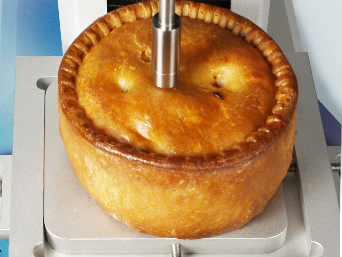 Penetrometry stainless steel cylinder probe compresses the pastry surface locally